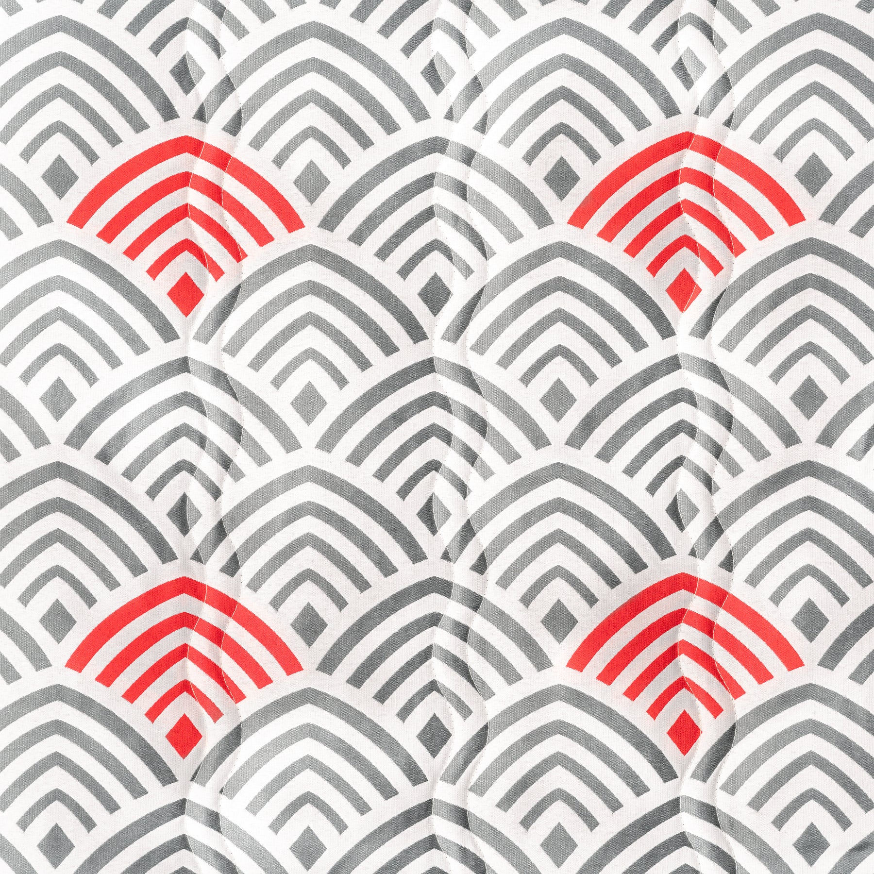 Close up of the fabric and pattern for the Bliss Hammocks 55-inch Wide 2-Person Reversible Quilted Hammock in the tonal arches red and gray variation.