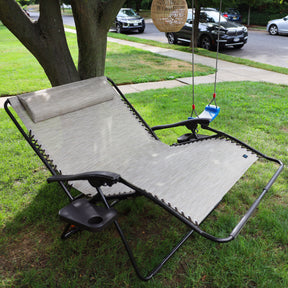45-inch 2-Person sand Zero Gravity Chair on a lawn under a tree.