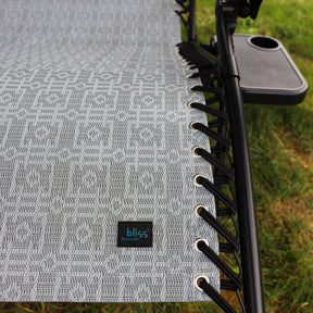 Close-up of the fabric and bungee cords for the Bliss Hammocks 45-inch Wide 2-Person Zero Gravity Chair with Pillow and Drink Tray in the gray variation.