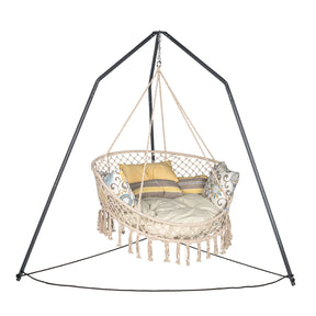 Bliss Hammocks 55-inch 2 Person Bohemian Style Macramé Swing Chair with Pillows hanging from the Bliss Hammocks Overhead Tripod Hammock Chair Stand.