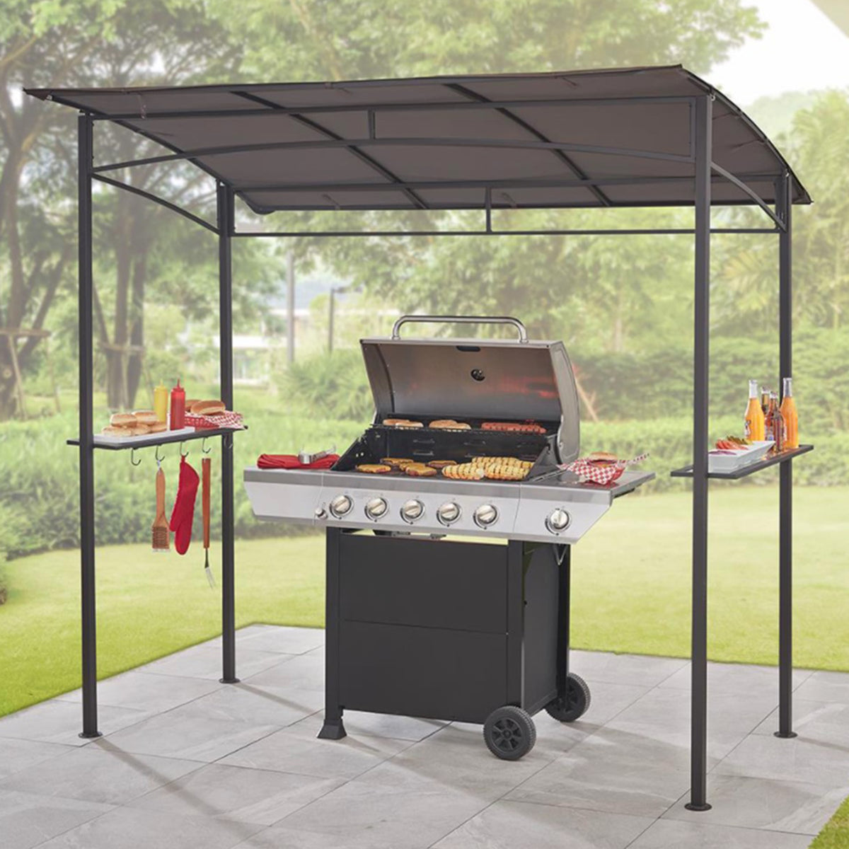 Bliss Outdoors 85” BBQ Grill Gazebo Canopy with Serving Shelf and steel frame covering a grill that is cooking food. There are buns, condiments, and drinks sitting on the shelves that are built-in on the sides.