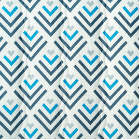Close up of the fabric and pattern for the Bliss Hammocks 55-inch Wide 2-Person Reversible Quilted Hammock in the blue geo diamond variation.