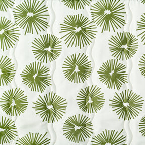 Close up of the fabric and pattern for the Bliss Hammocks 55-inch Wide 2-Person Reversible Quilted Hammock in the green burst variation.