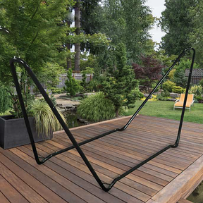 Bliss Hammocks 10-foot Hammock Stand with Hanging Hooks on top of a backyard patio.