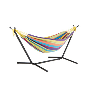 Bliss Hammocks 60-inch Wide Hammock & Built-in Stand in the Candy Stripe variation, consisting of colored stripes: green, orange, blue, yellow, red, and purple.
