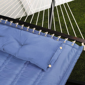 Close up of the fabric and spreader bar for the Bliss Hammocks 55-inch Wide Quilted Hammock with Spreader Bars and Pillow in the denim blue variation.