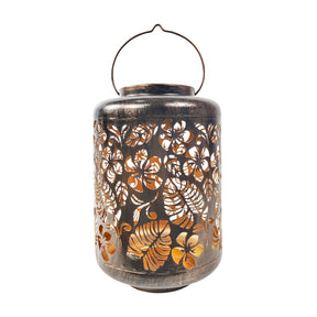 Bliss Outdoors 12-inch Tall Hanging and Tabletop Decorative Solar LED Lantern with Unique Tropical Flower Design and Antique Hand Painted Finish in the brushed bronze variation.
