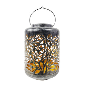 Bliss Outdoors 12-inch Tall Hanging and Tabletop Decorative Solar LED Lantern with Unique Olive Leaf Design and Antique Hand Painted Finish in the brushed silver variation.