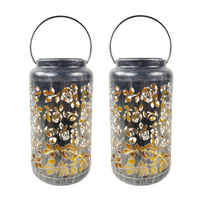 Bliss Outdoors 9-inch Tall 2-Pack Hanging and Tabletop Decorative Solar LED Lantern w/ Unique Rose Design and Antique Hand Painted Finish in the brushed silver variation.