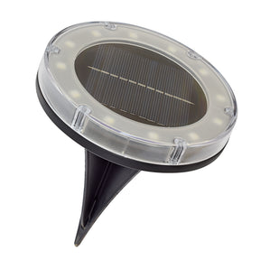 Angled view of the Bliss Outdoors Solar Powered Disc LED Pathway Light.