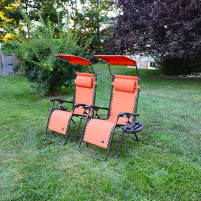 Set of 2 26-inch terracotta Zero Gravity Chairs on a lawn.