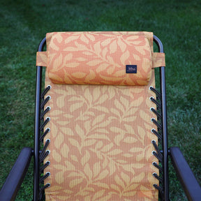 Close-up of the back rest and pillow on the 26-inch Reclining Amber Leaf Sling Chair.