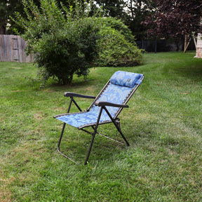 Angled view of a reclined 26-inch Blue Flower Reclining Sling Chair on a lawn.
