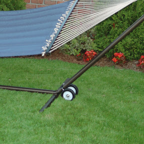 Bliss Hammocks Wheel Kit with Rubber Drag attached to a stand outside in the grass.