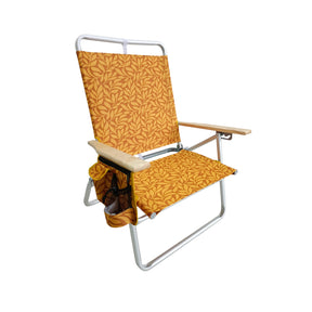 Bliss Hammocks Foldable Beach Chair with Side Pocket, 3 Reclining Positions, Storage Pouch, Phone Holder, Cup Holder, and Shoulder Strap. Amber Leaf variation is an orange color with a light orange leaf pattern.